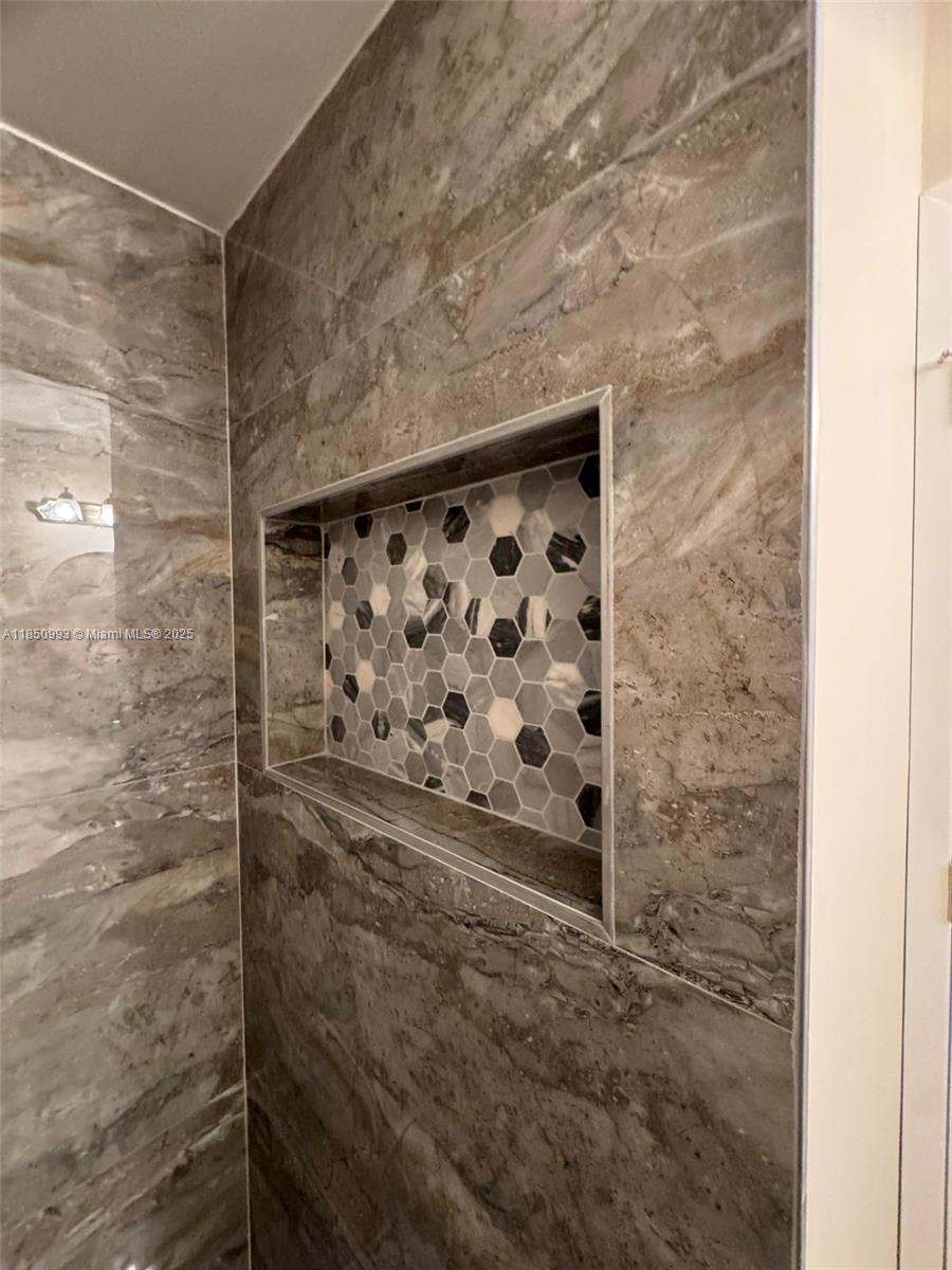 4520 Southwest 68th Ct Circle, Unit 305 Miami, FL 33155 - Photo 39 of 46 a bathroom with a shower