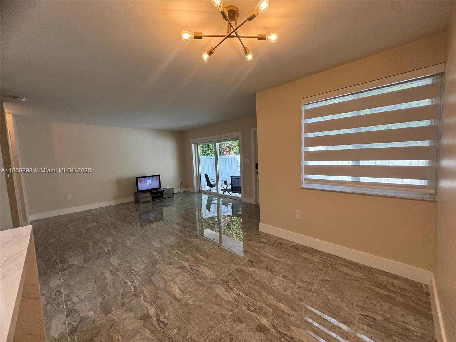 4520 Southwest 68th Ct Circle, Unit 305 Miami, FL 33155 - Photo 5 of 46 a view of livingroom with furniture and ceiling fan