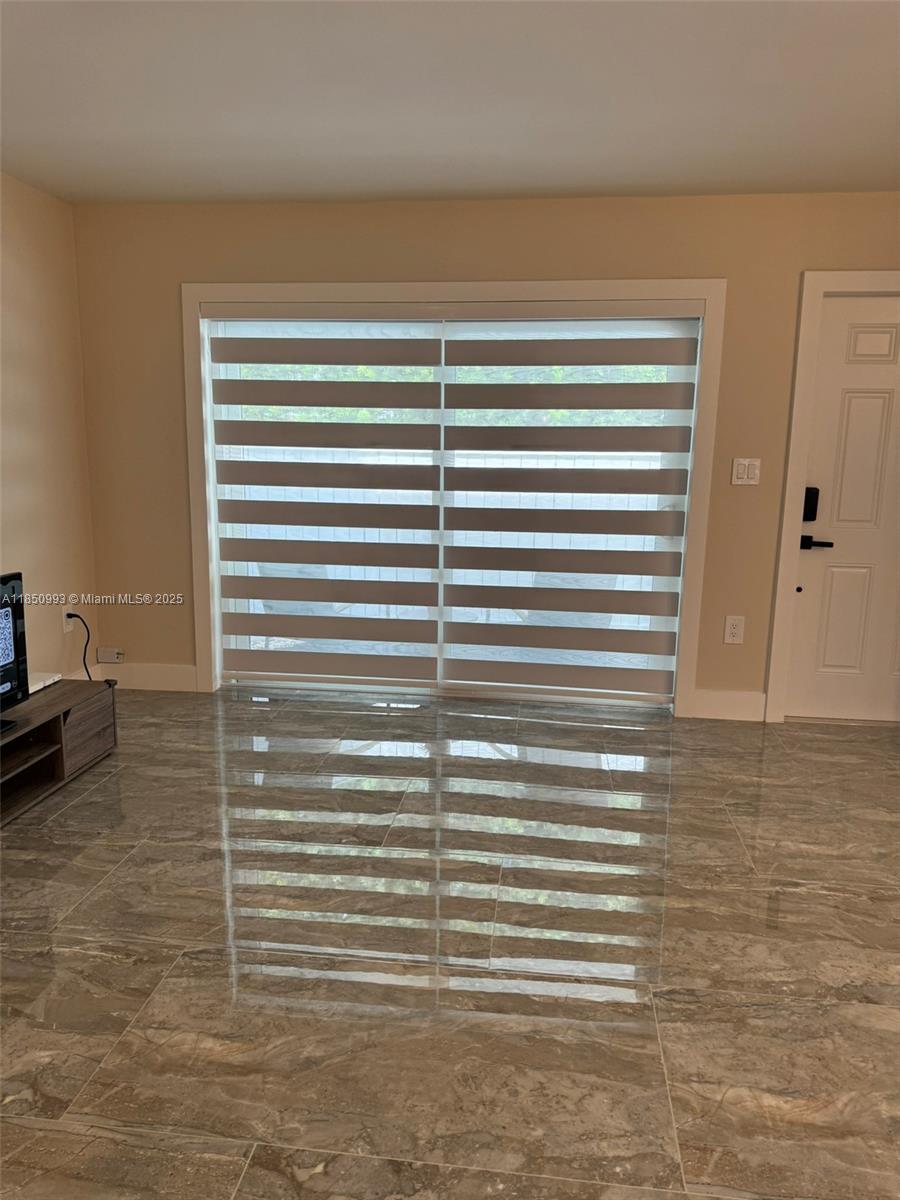 4520 Southwest 68th Ct Circle, Unit 305 Miami, FL 33155 - Photo 6 of 46 a view of a room with a window