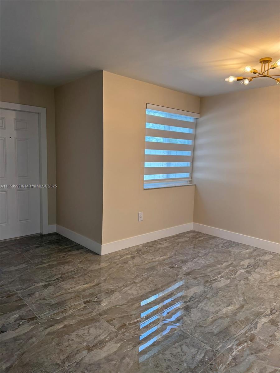 4520 Southwest 68th Ct Circle, Unit 305 Miami, FL 33155 - Photo 7 of 46 a view of a room with a window