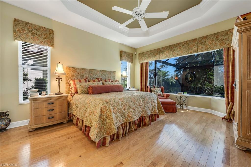 20001 Chapel Trace Estero, FL 33928 - Photo 11 of 32 a bed room with a bed and a large window