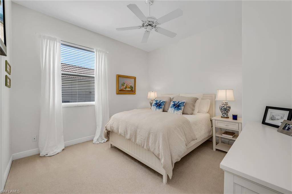 20001 Chapel Trace Estero, FL 33928 - Photo 13 of 32 a bed room with double bed and a closet