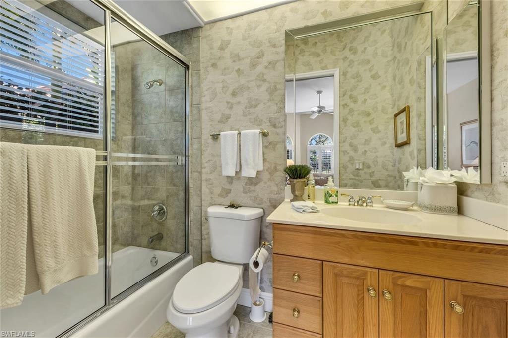 20001 Chapel Trace Estero, FL 33928 - Photo 16 of 32 a bathroom with a sink toilet and shower