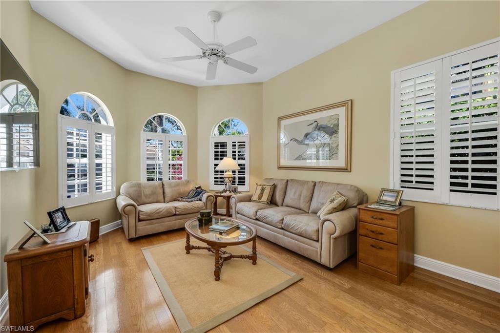 20001 Chapel Trace Estero, FL 33928 - Photo 17 of 32 a living room with furniture and a large window