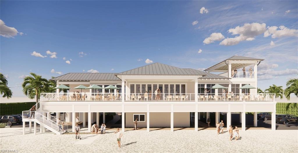 20001 Chapel Trace Estero, FL 33928 - Photo 26 of 32 a large building with a lot of windows