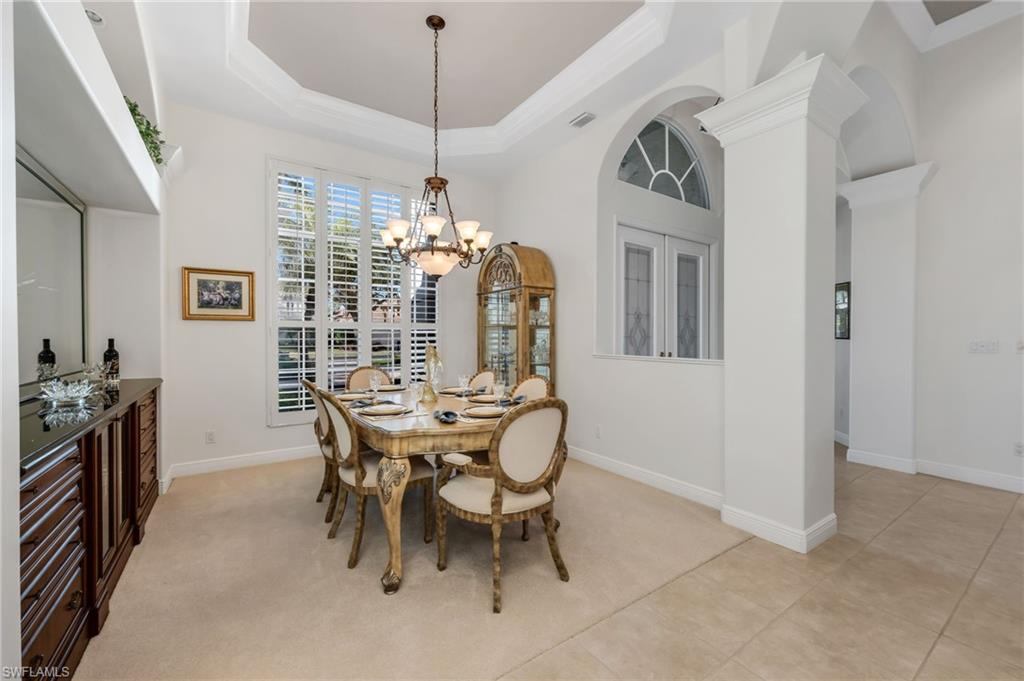 20001 Chapel Trace Estero, FL 33928 - Photo 8 of 32 a view of a dining room with furniture window and wooden floor