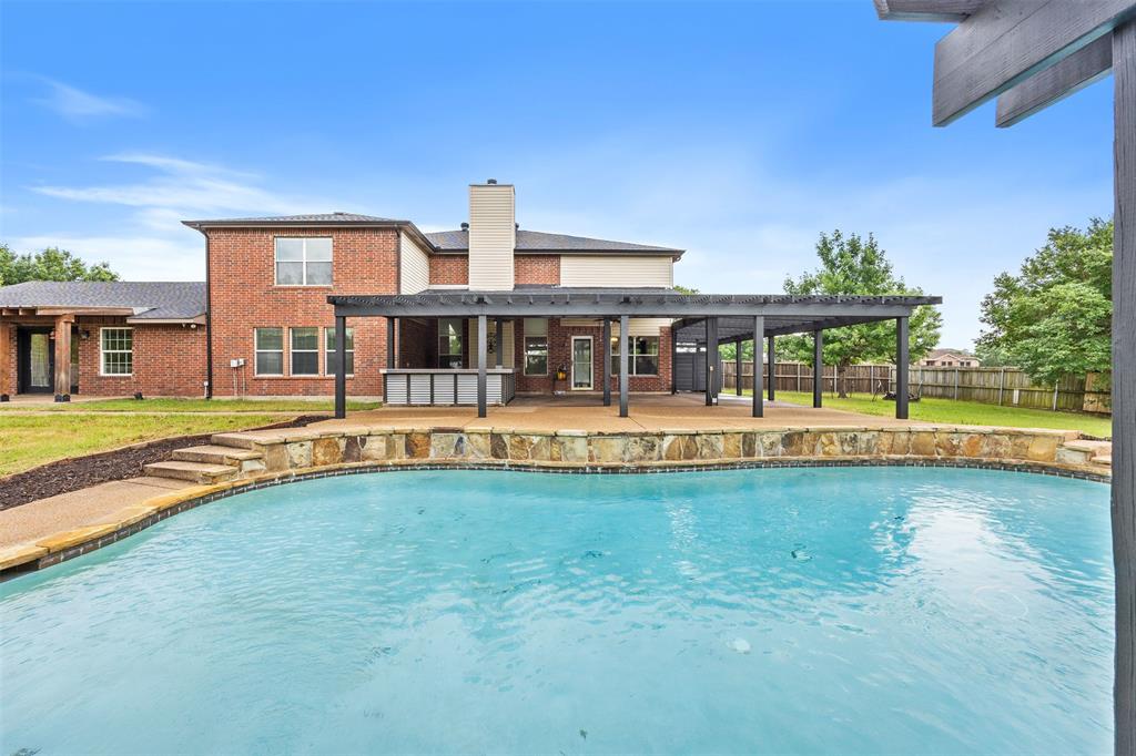 3931 Alpha Way Midlothian, TX 76065 - Photo 29 of 33 a view of swimming pool with outdoor seating