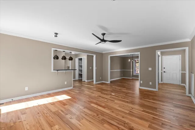 a view of a livingroom with wooden floor