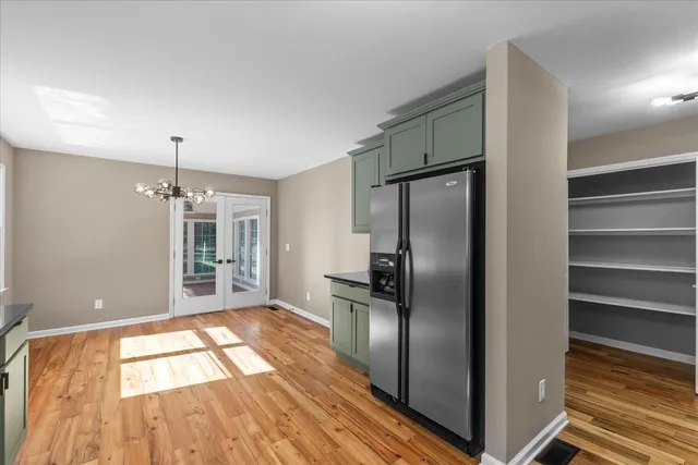 a view of an empty room and window