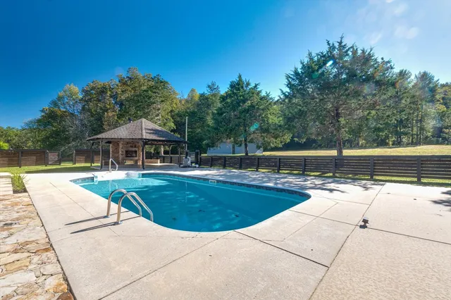 an empty room with furniture and window