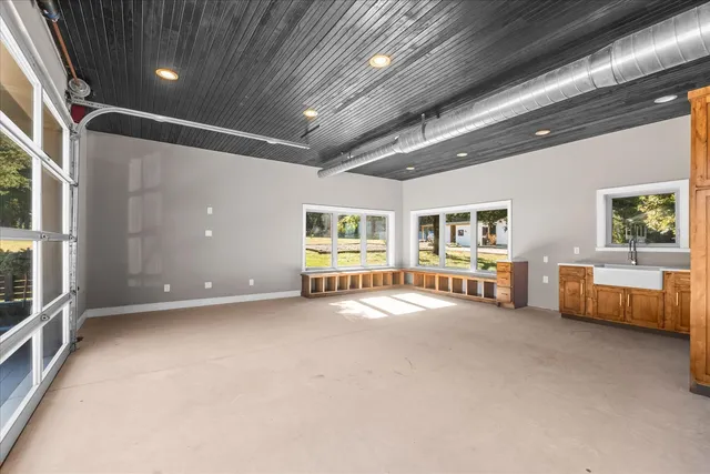 a view of a house with a tree