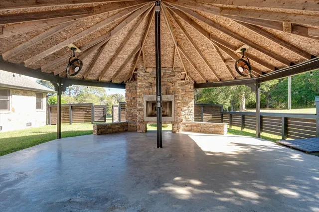 a view of outdoor space with deck and trees