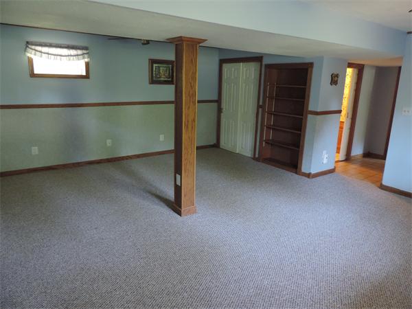 7 Haskell Road Pepperell, MA 01463 - Photo 12 of 25 an empty room with closet and windows