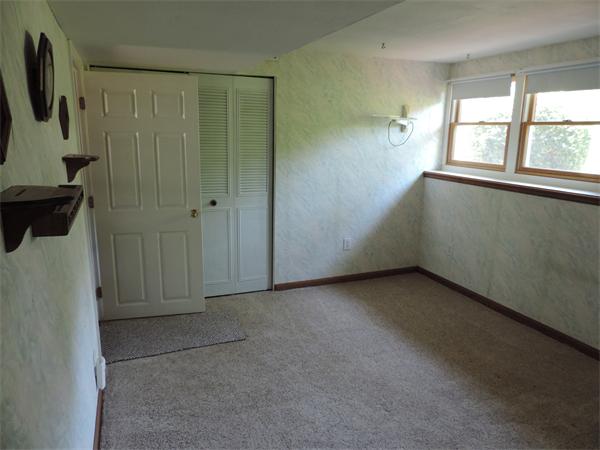 7 Haskell Road Pepperell, MA 01463 - Photo 14 of 25 an empty room with windows