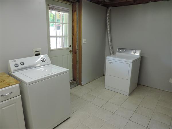 7 Haskell Road Pepperell, MA 01463 - Photo 16 of 25 a utility room with dryer and washer