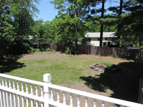 7 Haskell Road Pepperell, MA 01463 - Photo 20 of 25 a view of a backyard with pathway