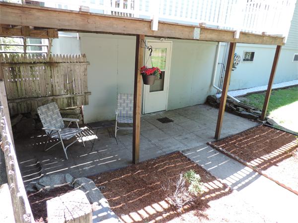 7 Haskell Road Pepperell, MA 01463 - Photo 21 of 25 a backyard of a house with seating space
