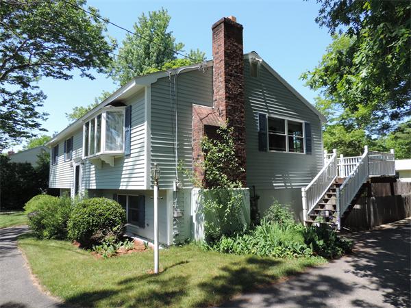 7 Haskell Road Pepperell, MA 01463 - Photo 25 of 25 a front view of a house with a yard