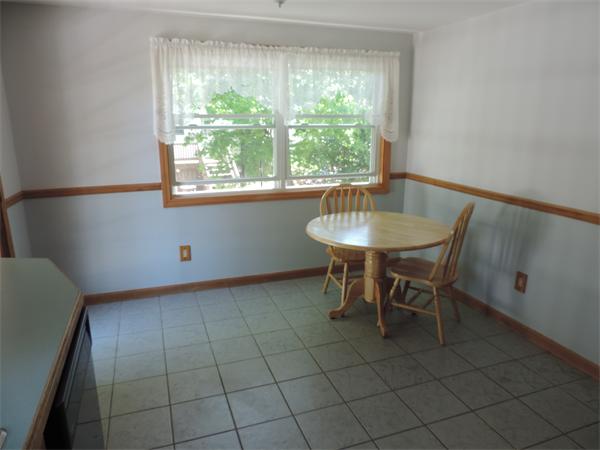 7 Haskell Road Pepperell, MA 01463 - Photo 7 of 25 a dining room with furniture and a window