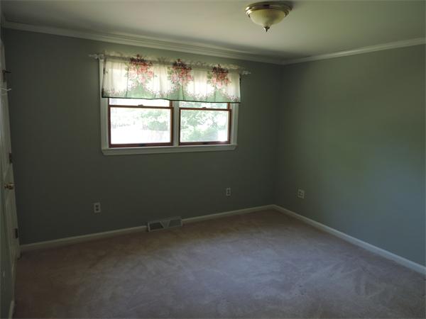 7 Haskell Road Pepperell, MA 01463 - Photo 8 of 25 an empty room with a window