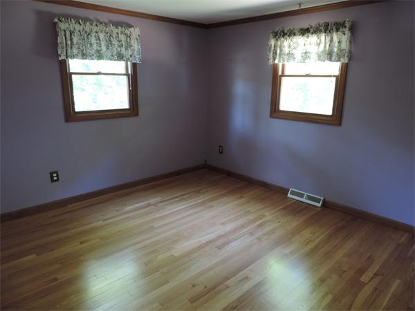 7 Haskell Road Pepperell, MA 01463 - Photo 9 of 25 an empty room with a window