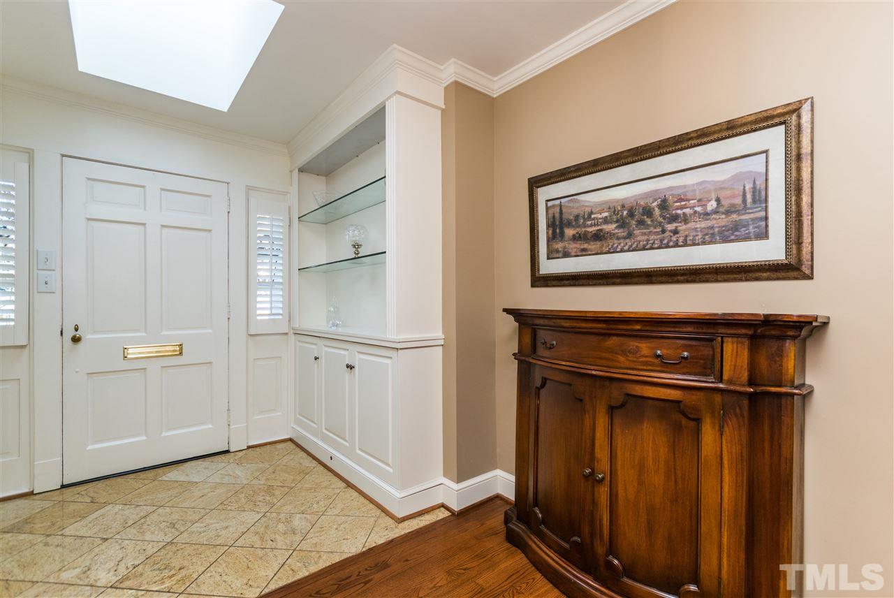 1422 Canterbury Road Raleigh, NC 27608 - Photo 2 of 25 a view of a hallway with wooden floor