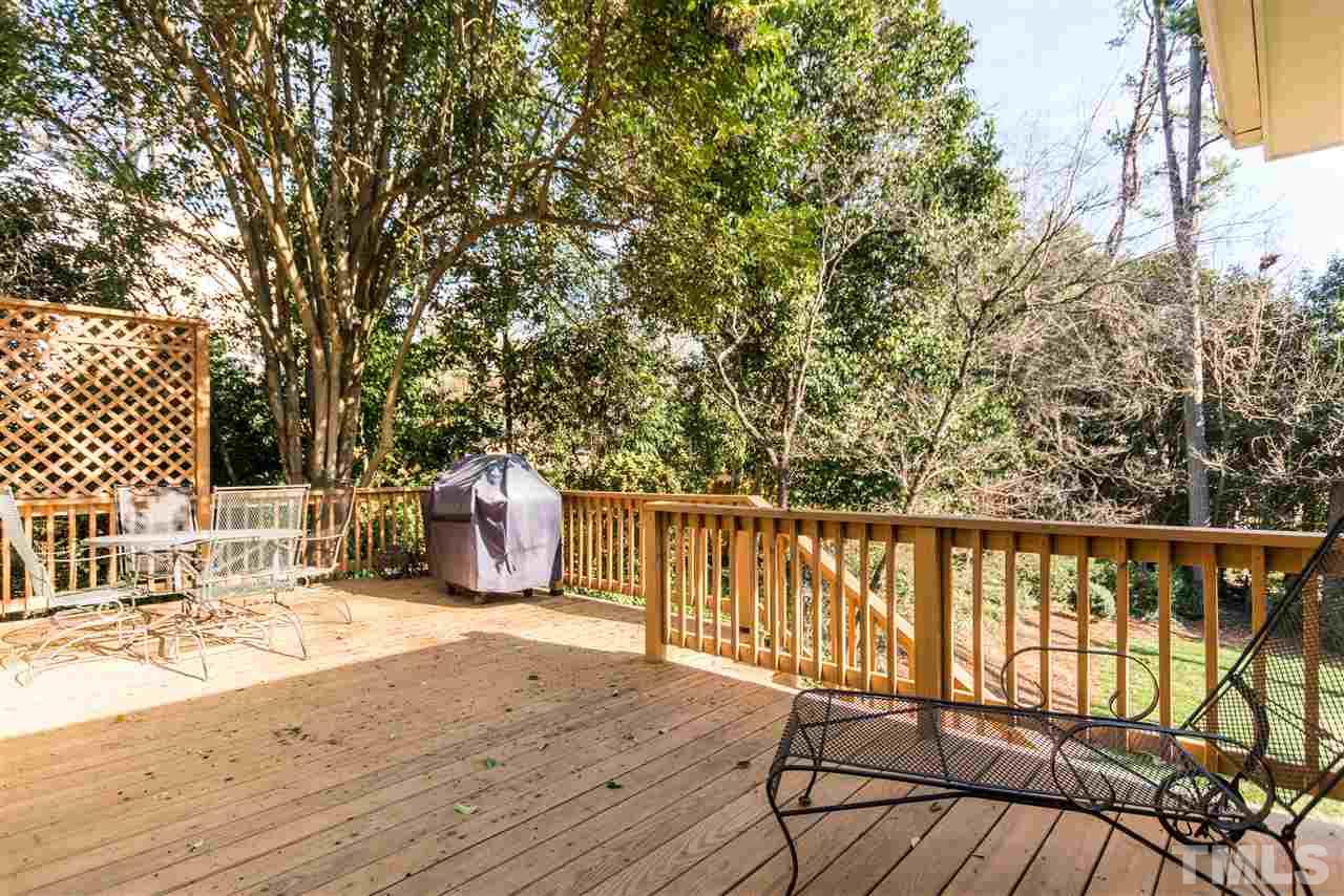 1422 Canterbury Road Raleigh, NC 27608 - Photo 23 of 25 a view of balcony with wooden floor and seating space