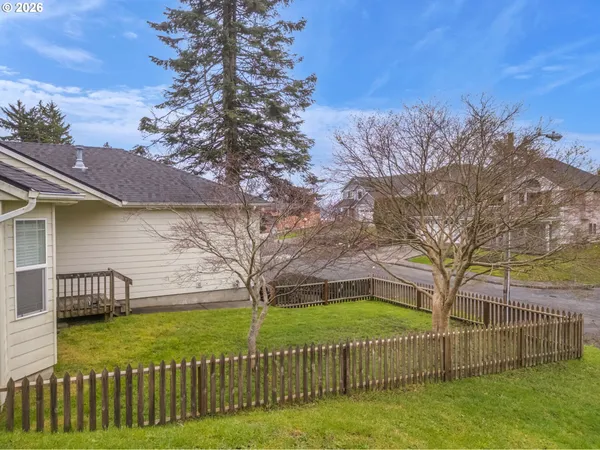an aerial view of residential house with outdoor space