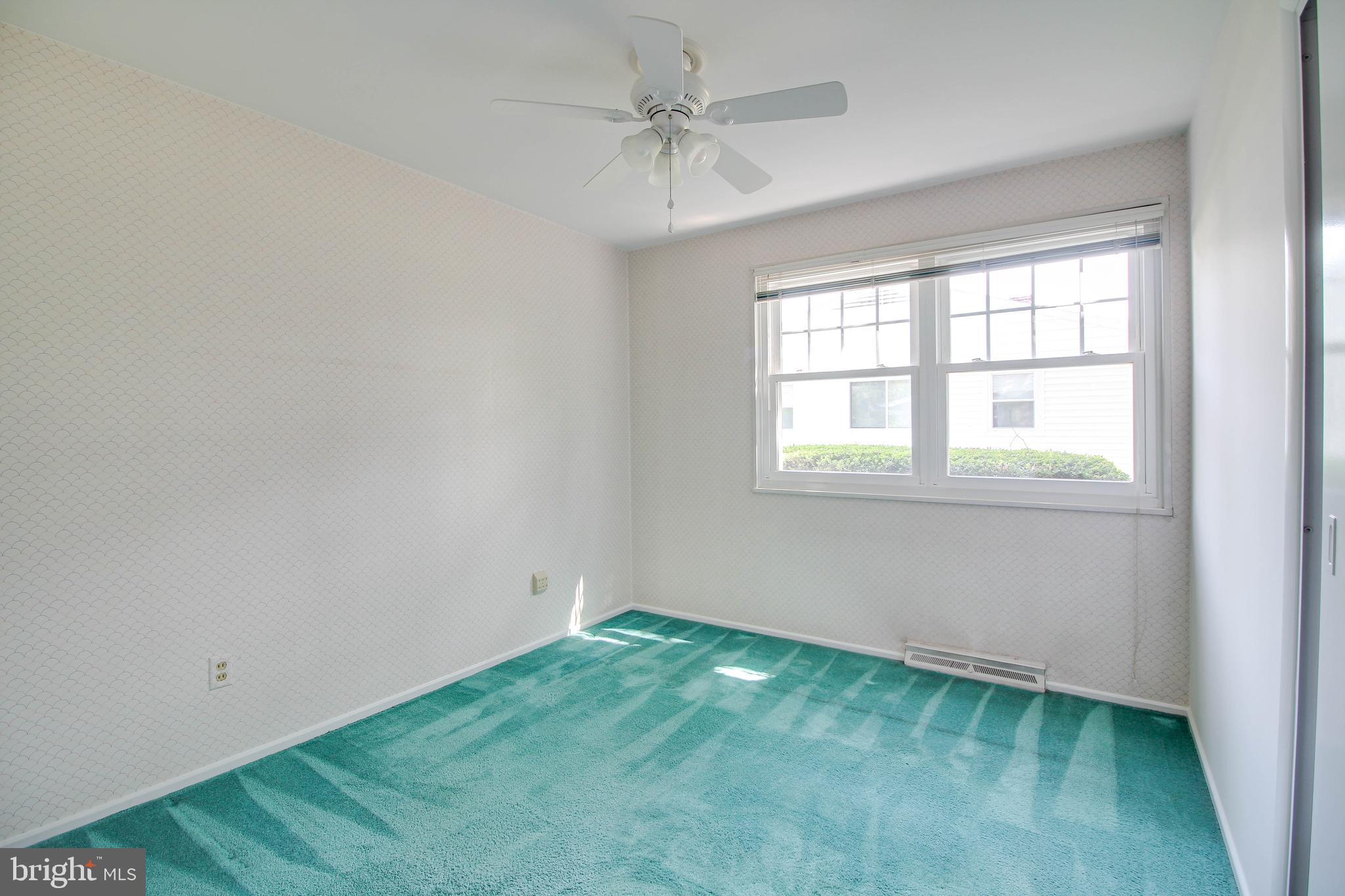 133 East Timonium Road Lutherville-Timonium, MD 21093 - Photo 12 of 27 3rd bedroom. Wood floors under carpet
