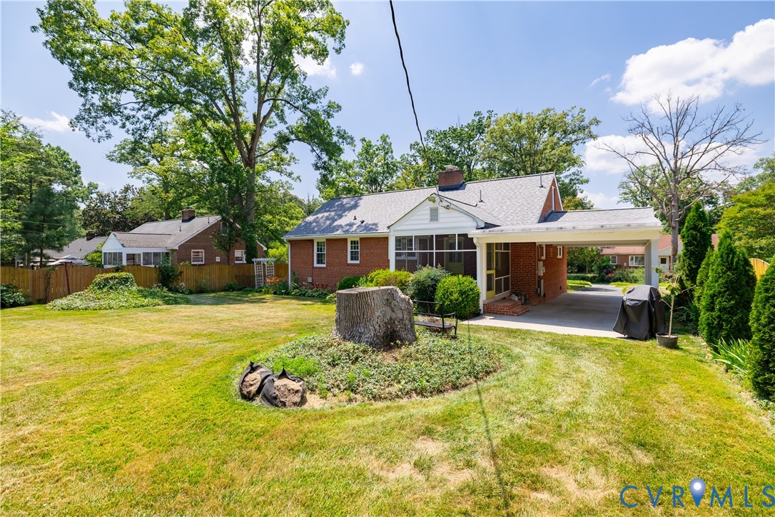 1107 Ridgecrest Drive Henrico, VA 23229 - Photo 24 of 26 Expansive backyard with a manicured lawn, establis