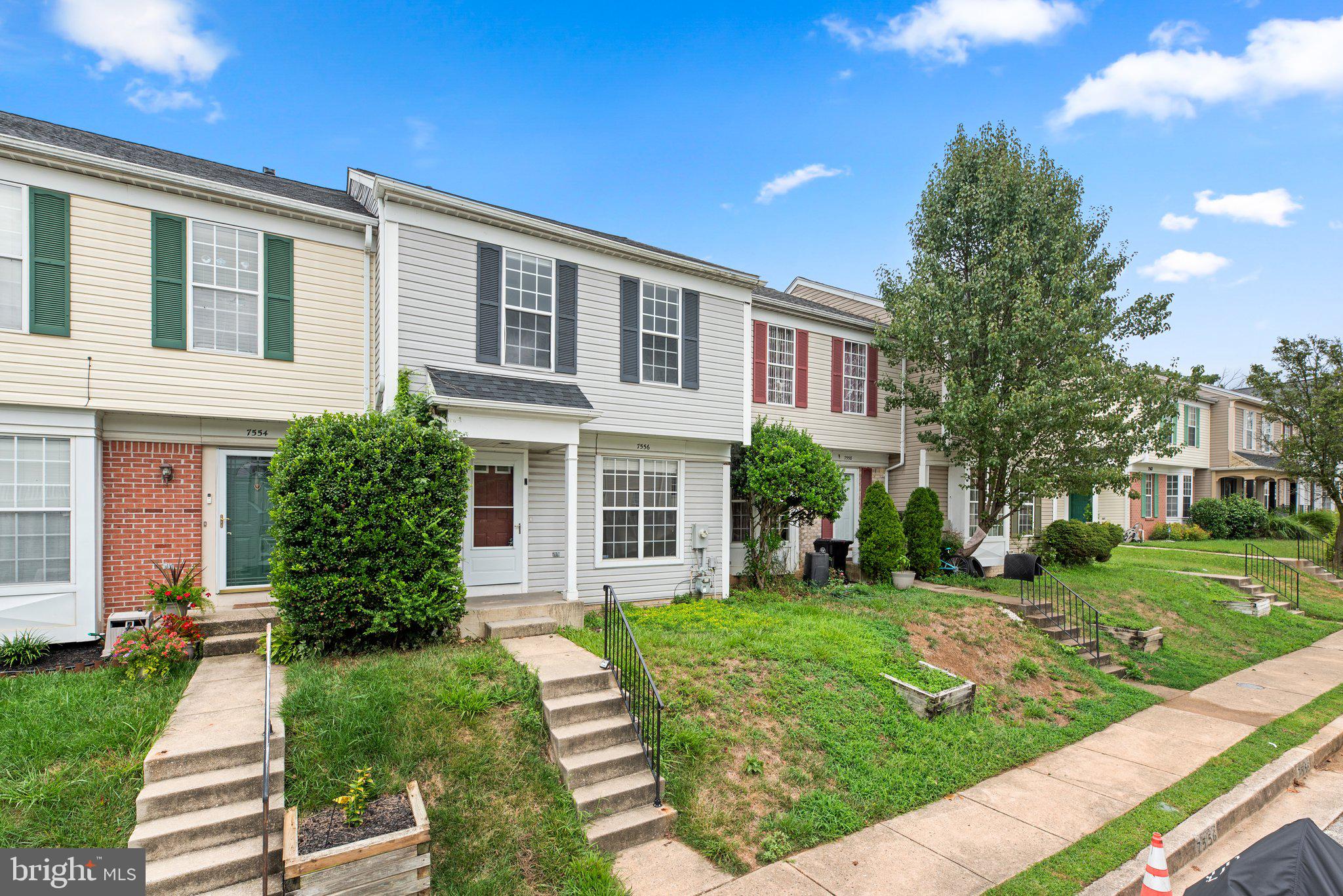 7556 Maury Road Windsor Mill, MD 21244 - Photo 1 of 1 a front view of a house with a yard
