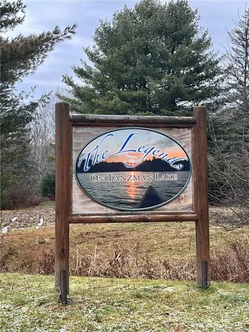 a view of fountain in the middle of a lake