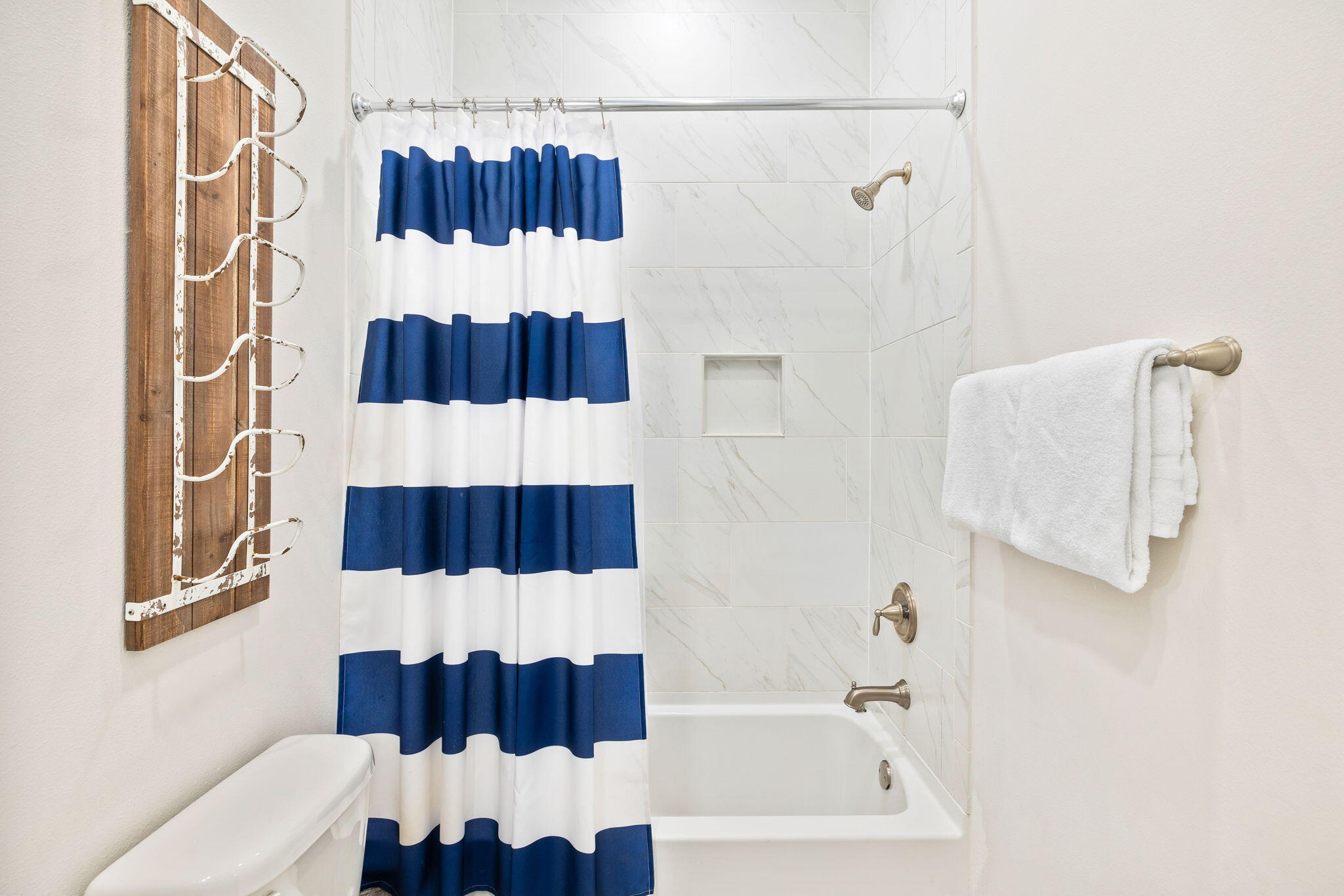 34 Pine Lands Loop Inlet Beach, Unit B Inlet Beach, FL 32461 - Photo 12 of 33 a bathroom with a bathtub and shower