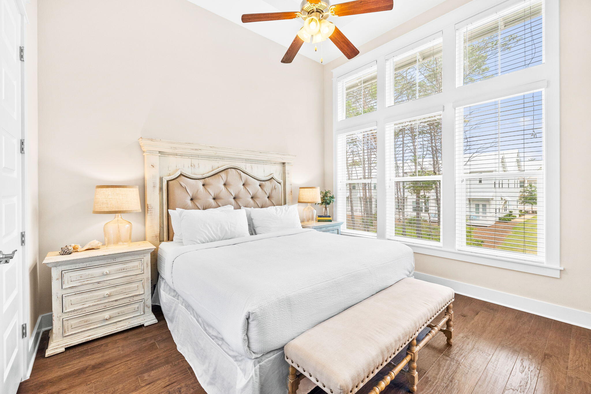 34 Pine Lands Loop Inlet Beach, Unit B Inlet Beach, FL 32461 - Photo 15 of 33 a bedroom with a bed and wooden floor