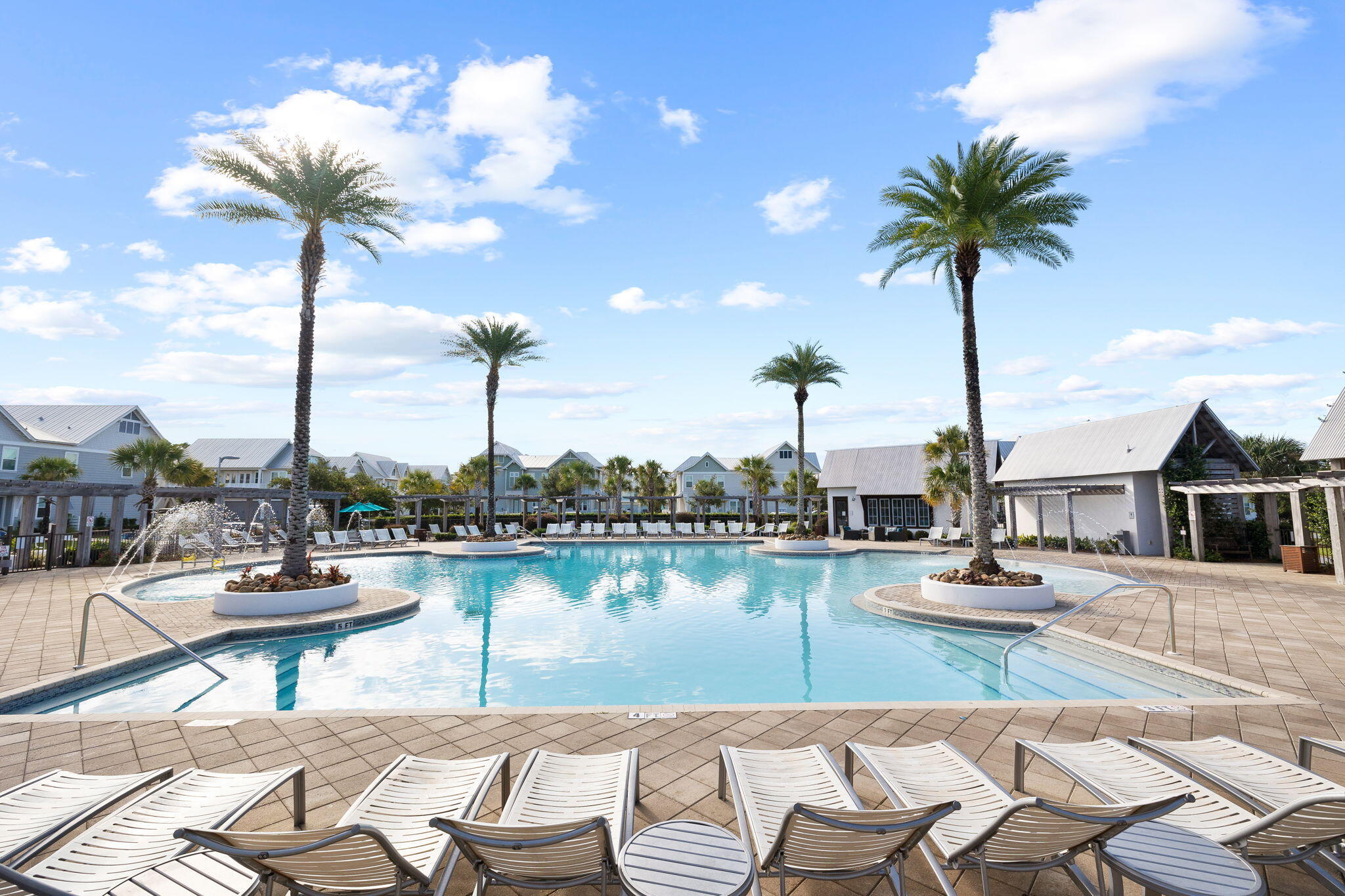 34 Pine Lands Loop Inlet Beach, Unit B Inlet Beach, FL 32461 - Photo 20 of 33 a view of a lake with couches and chairs