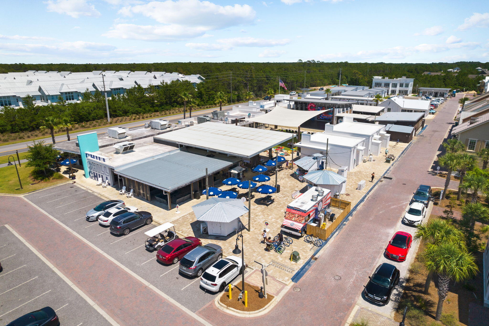 34 Pine Lands Loop Inlet Beach, Unit B Inlet Beach, FL 32461 - Photo 29 of 33 an aerial view of a dinning table and chairs with the view of city