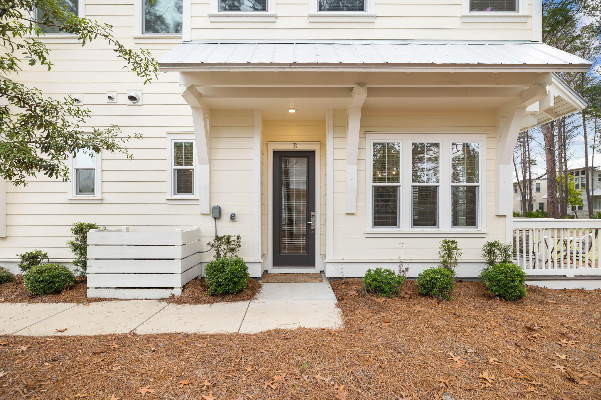 34 Pine Lands Loop Inlet Beach, Unit B Inlet Beach, FL 32461 - Photo 5 of 33 a view of a house with a outdoor space