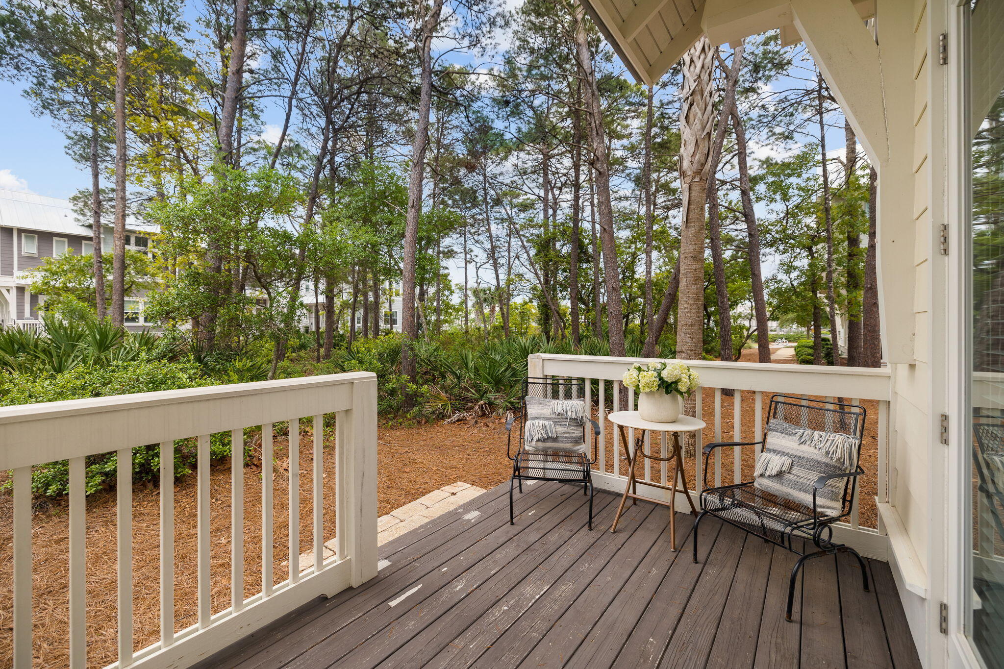 34 Pine Lands Loop Inlet Beach, Unit B Inlet Beach, FL 32461 - Photo 6 of 33 a view of a wooden chairs on deck