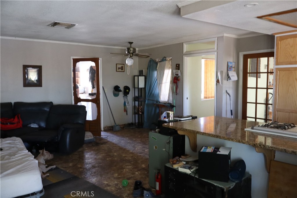 47150 Black Butte Road Newberry Springs, CA 92365 - Photo 12 of 27 a room with furniture and a window