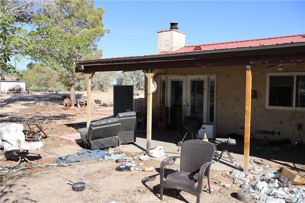 47150 Black Butte Road Newberry Springs, CA 92365 - Photo 19 of 27 a view of a patio with a wooden fence