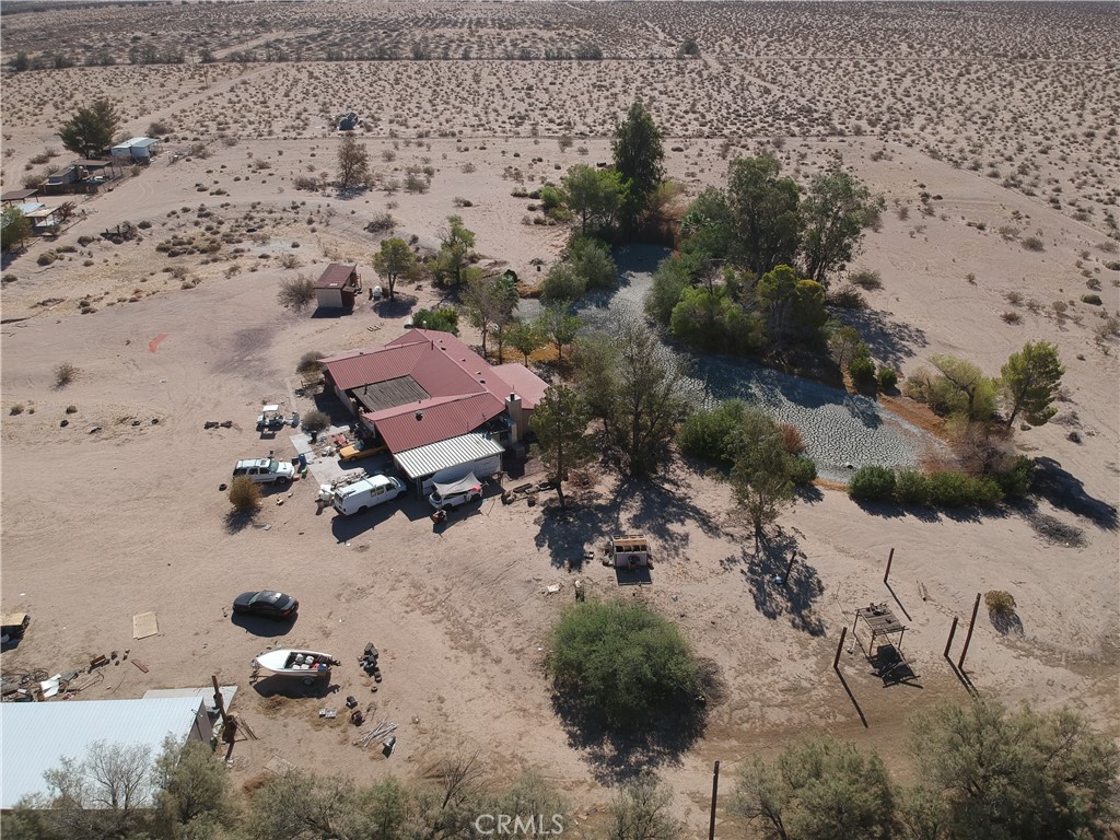 47150 Black Butte Road Newberry Springs, CA 92365 - Photo 26 of 27 an aerial view of a house with a yard