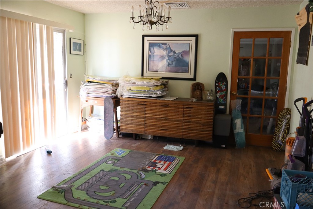 47150 Black Butte Road Newberry Springs, CA 92365 - Photo 6 of 27 a view of a workspace with furniture and a window