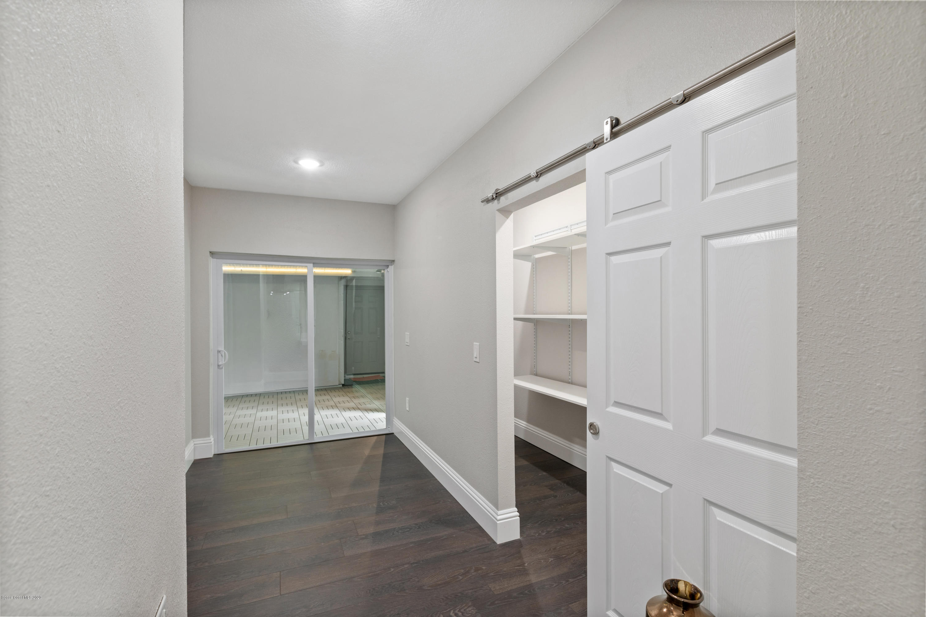 1790 Harlock Road Melbourne, FL 32934 - Photo 15 of 47 wooden floor in an empty room