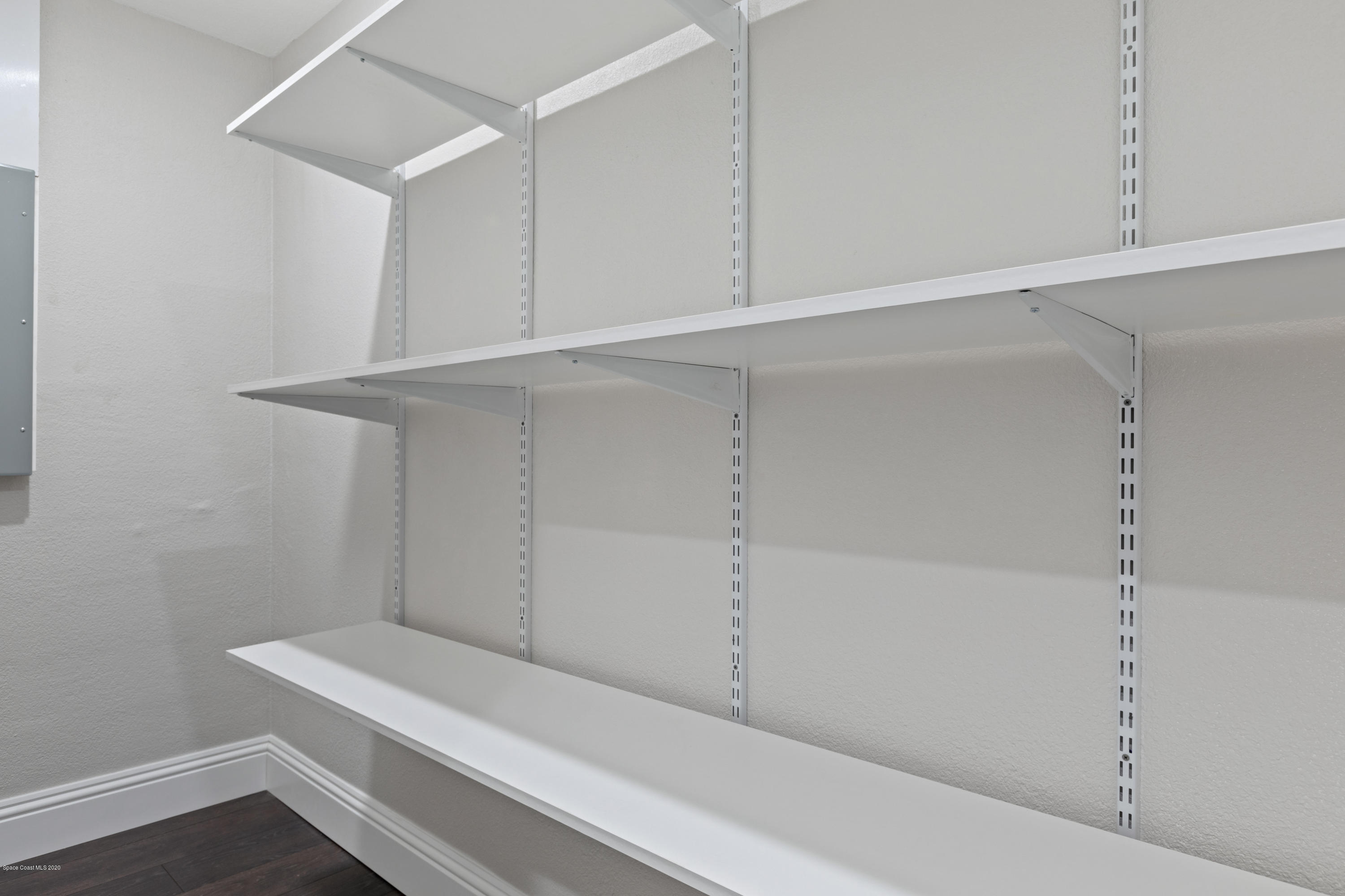 1790 Harlock Road Melbourne, FL 32934 - Photo 16 of 47 a view of an empty walk in closet
