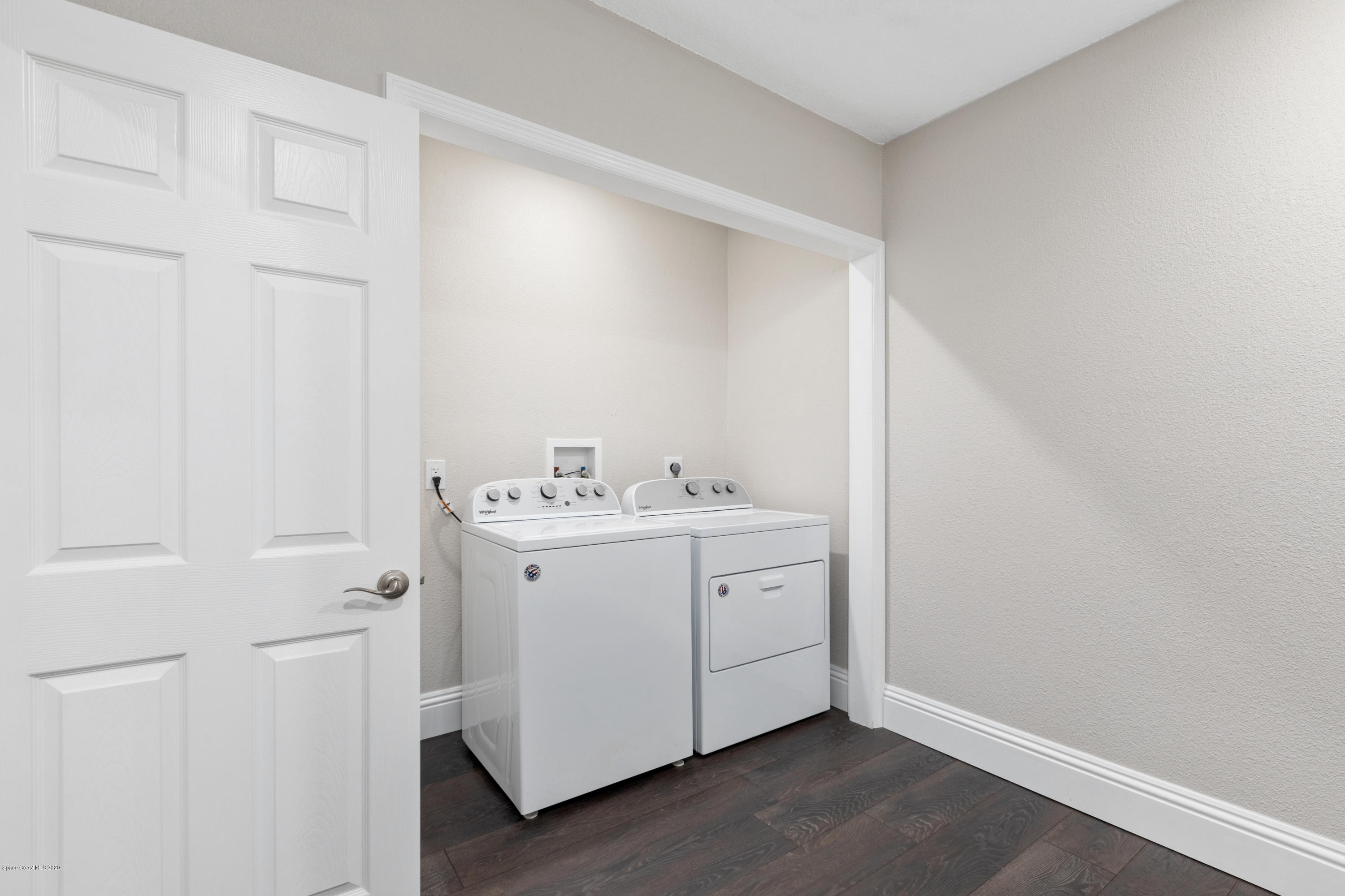 1790 Harlock Road Melbourne, FL 32934 - Photo 18 of 47 a room with a sink and a mirror