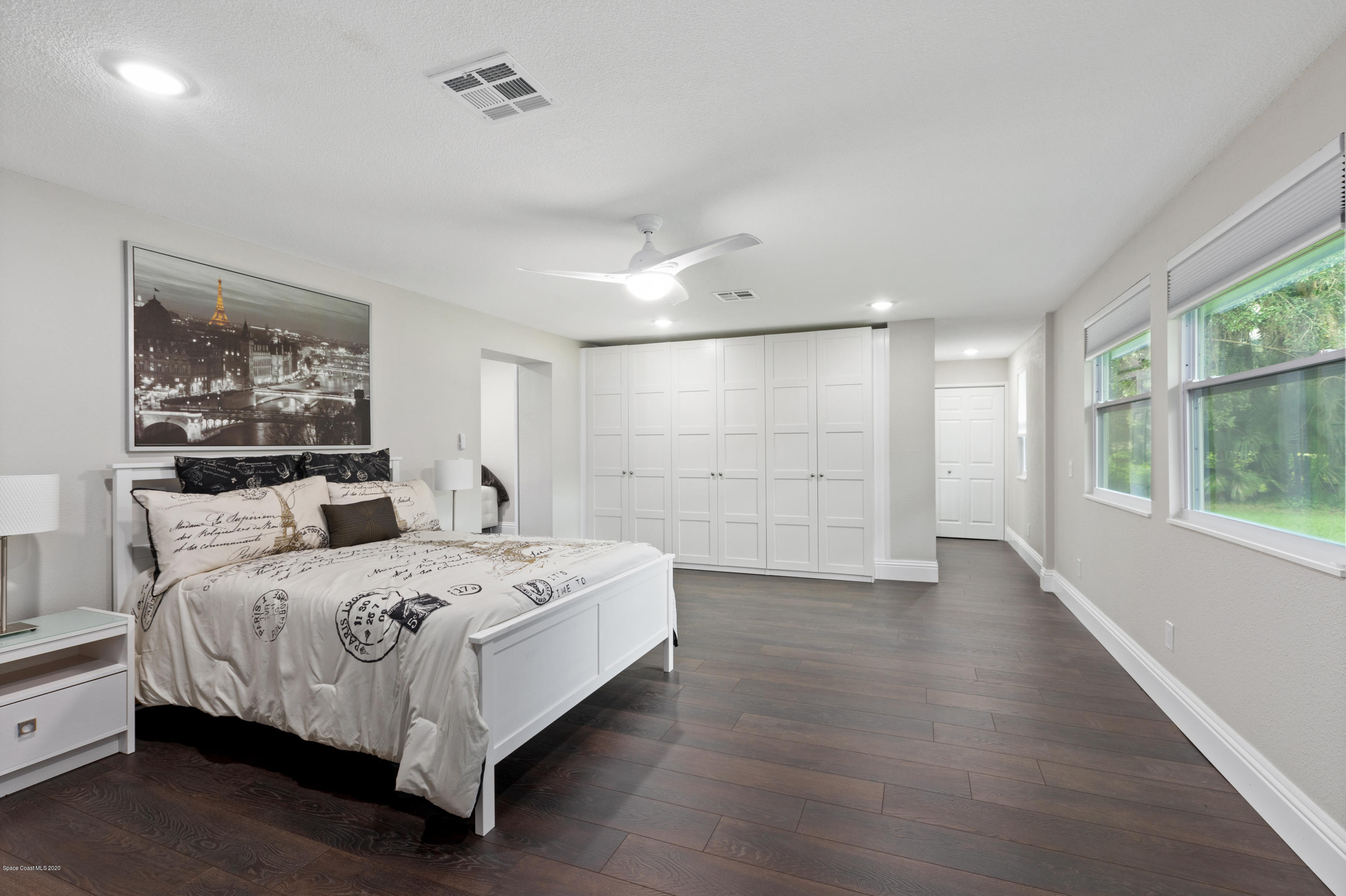 1790 Harlock Road Melbourne, FL 32934 - Photo 19 of 47 a bedroom with a bed and a window
