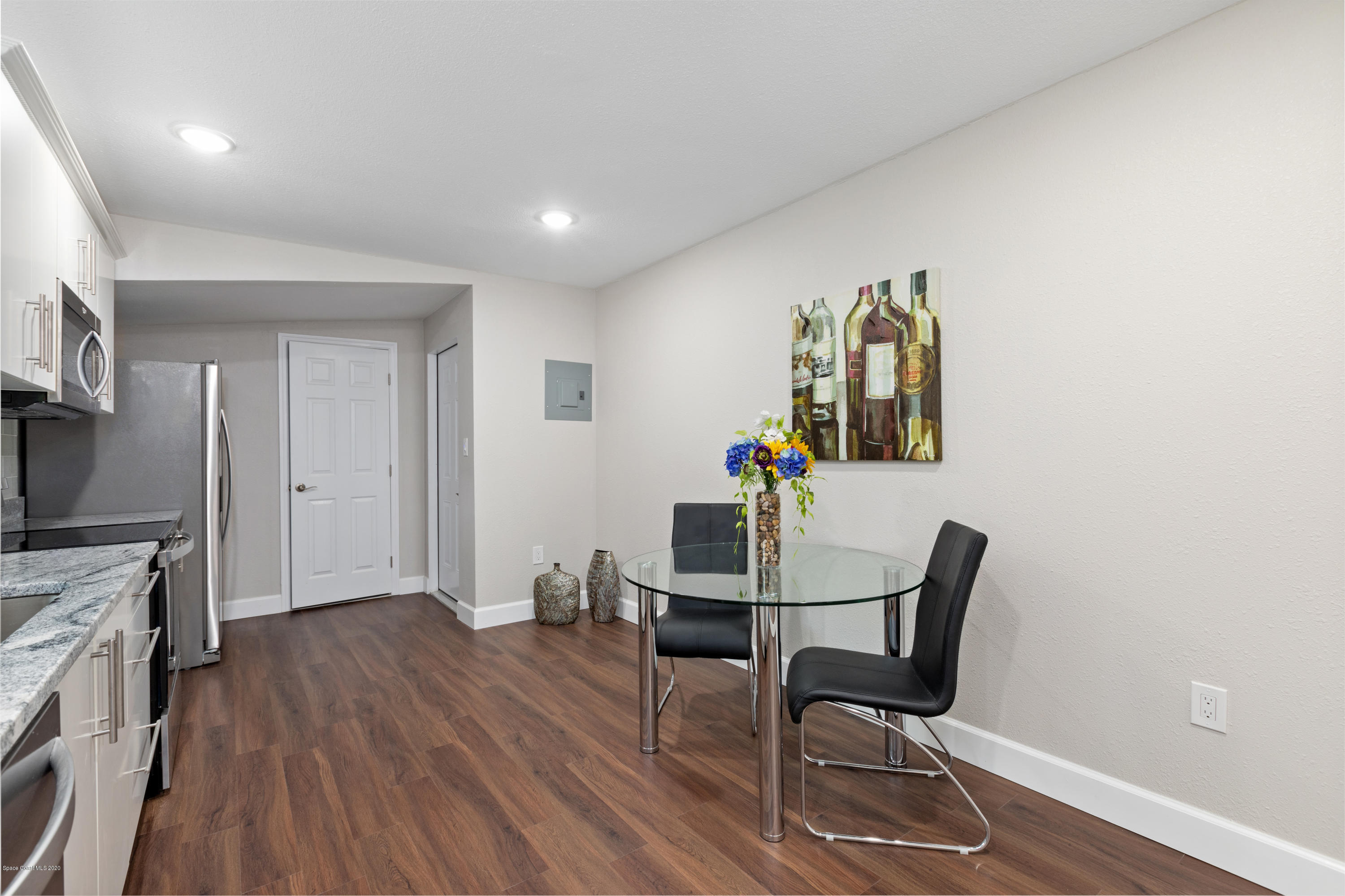 1790 Harlock Road Melbourne, FL 32934 - Photo 40 of 47 a view of a workspace with furniture and wooden floor