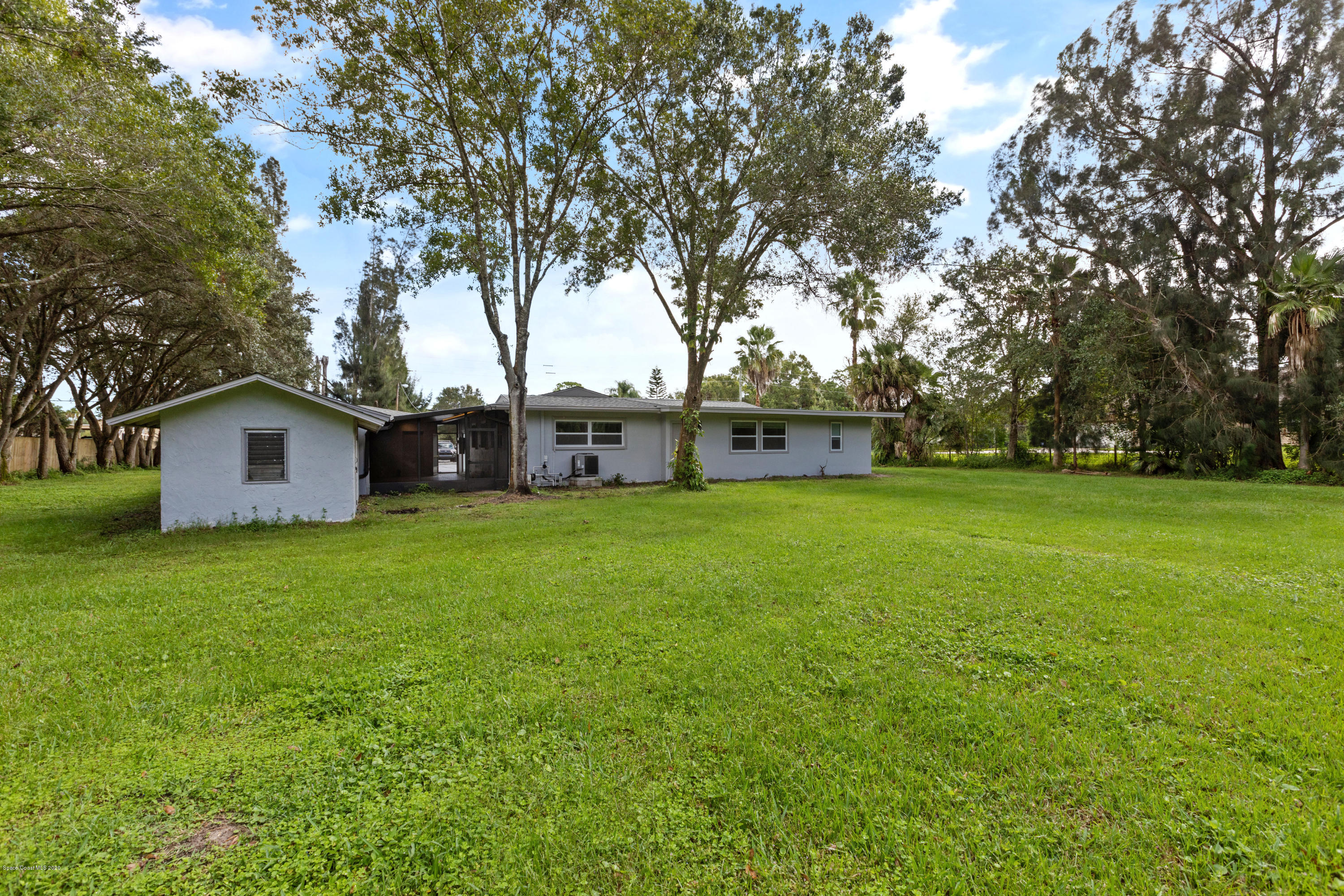 1790 Harlock Road Melbourne, FL 32934 - Photo 45 of 47 a view of a house with a yard