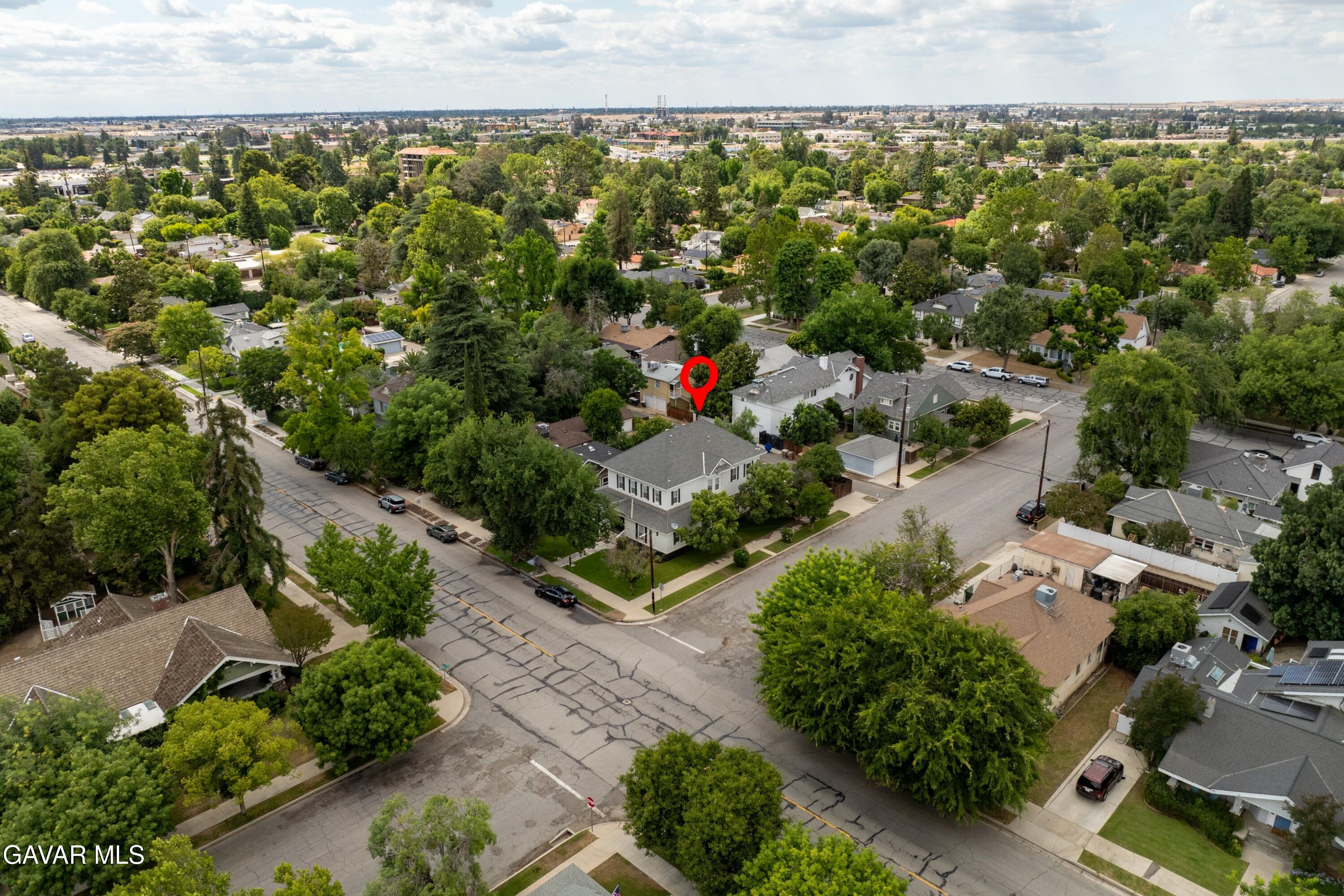 2702 19th Street Bakersfield, CA 93301 - Photo 15 of 21 an aerial view of a house with a yard