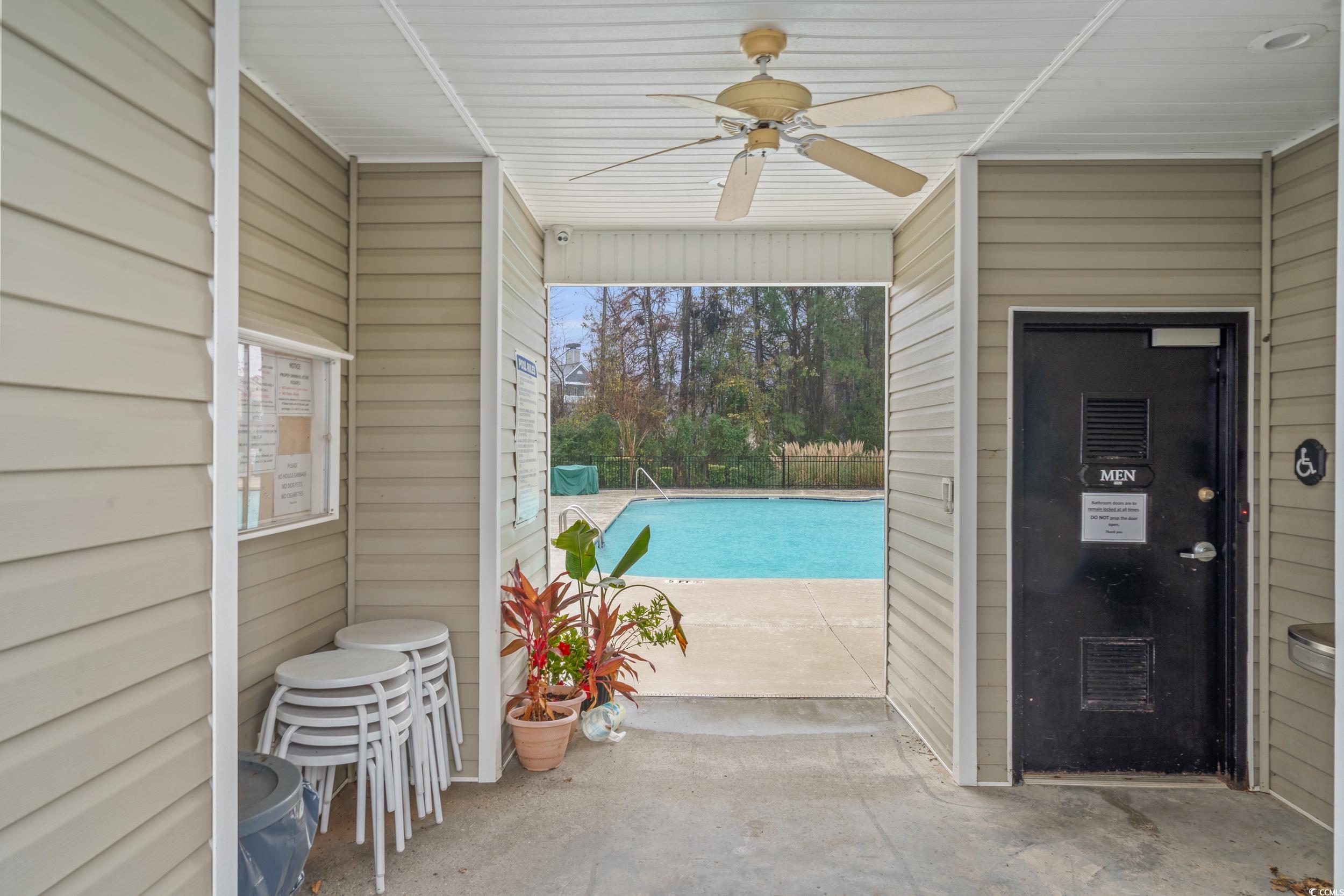 104 Olde Towne Way, Unit 5 Myrtle Beach, SC 29588 - Photo 23 of 24 Outdoor pool with a patio area